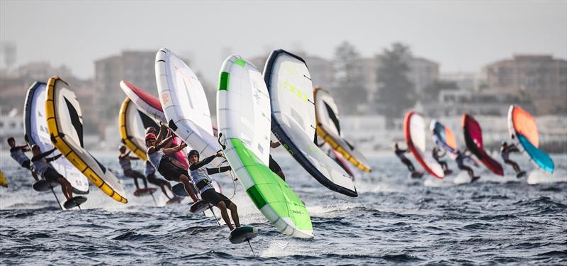 Ratotti's green wing leads the fleet - 2023 WingFoil Racing World Cup Cagliari - Day 1 photo copyright IWSA Media / Robert Hajduk taken at  and featuring the Wing Foil class