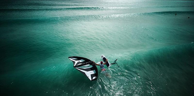 Czech rider Stepan Benes swims away from Poetto Beach photo copyright IWSA media / Robert Hajduk taken at  and featuring the Wing Foil class