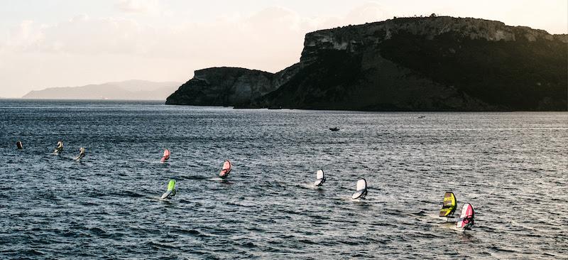 Offshore and gusty, but spectacular too in the setting sun - 2023 WingFoil Racing World Cup Cagliari photo copyright IWSA media / Robert Hajduk taken at  and featuring the Wing Foil class