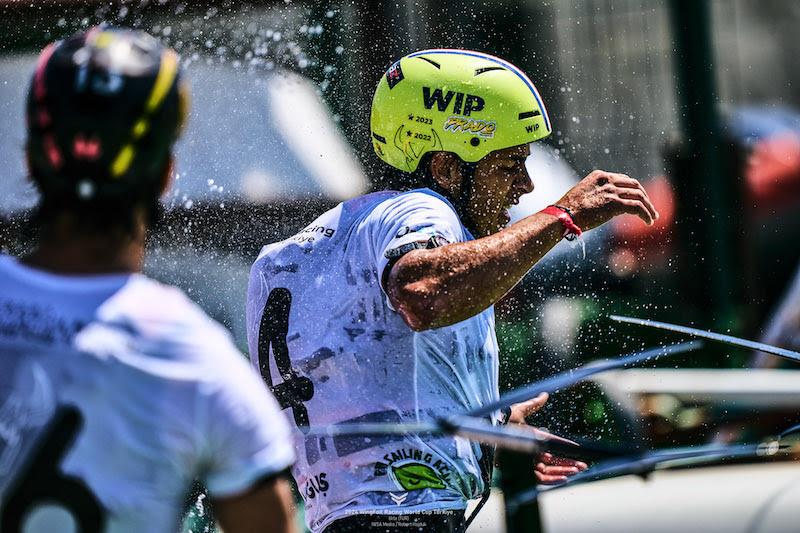 Mathis Ghio getting an unwanted hose down from brother Romain - 2024 WingFoil Racing World Cup Turkiye day 3 - photo © IWSA media / Robert Hajduk