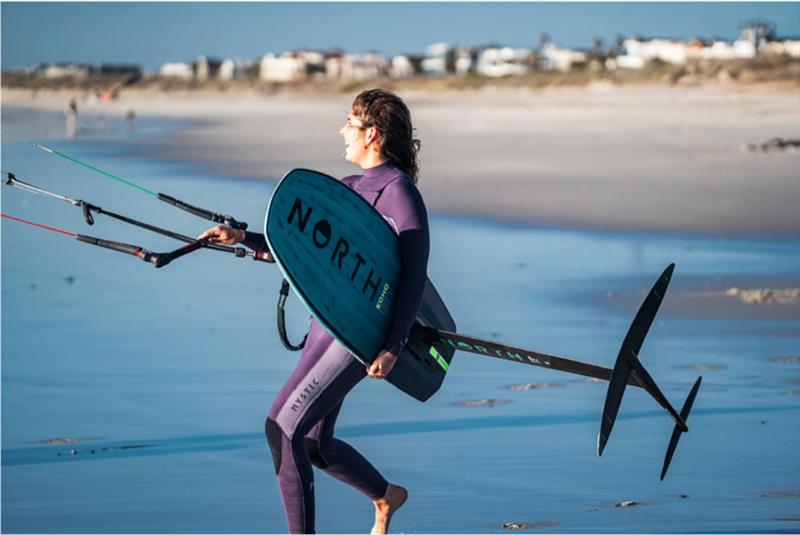 North Team rider Francesca Maini with the Echo Pro foil board, jumping in the water for a session in Cape Town - photo © Nomadic Sea