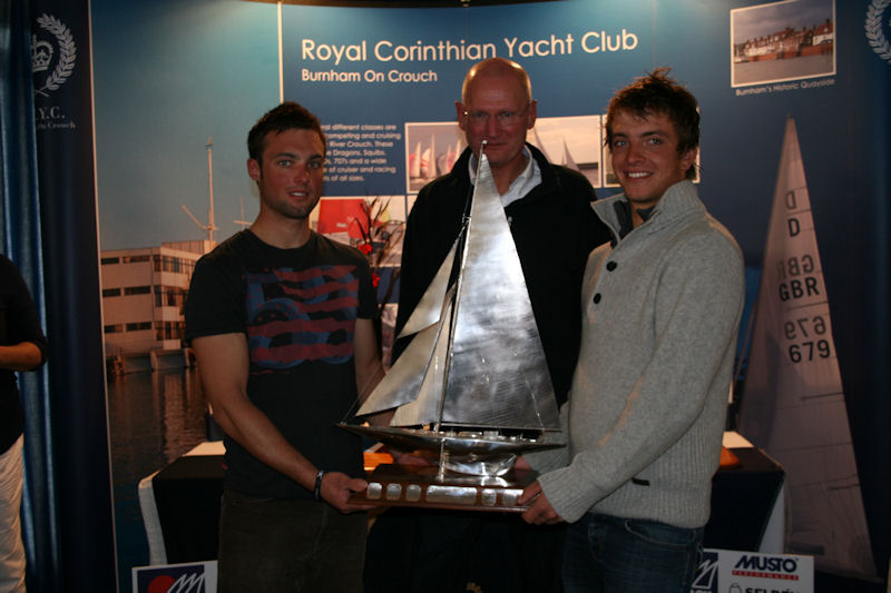 Robert Coyle, RCYC commodore, (centre) presents winners Ben Saxton (right) and Alan Roberts (left) with the solid silver Endeavour Trophy photo copyright Sue Pelling taken at  and featuring the Topaz Xenon class