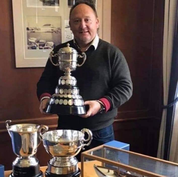 Simon Russell with the Captain's Cup - photo © Russell family