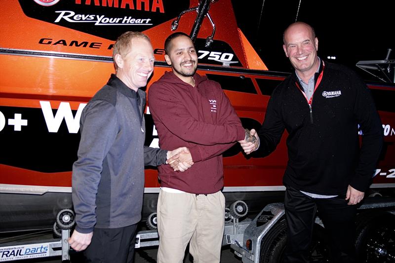 Photo shows Surtees' Adam Dyck, lucky Grand Prize winner Jonathan Couronne and Yamaha Marine NZ's Matt Walton-Smith in front of Jonathan's new Surtees 750 Game Fisher photo copyright Mike Rose taken at  and featuring the  class