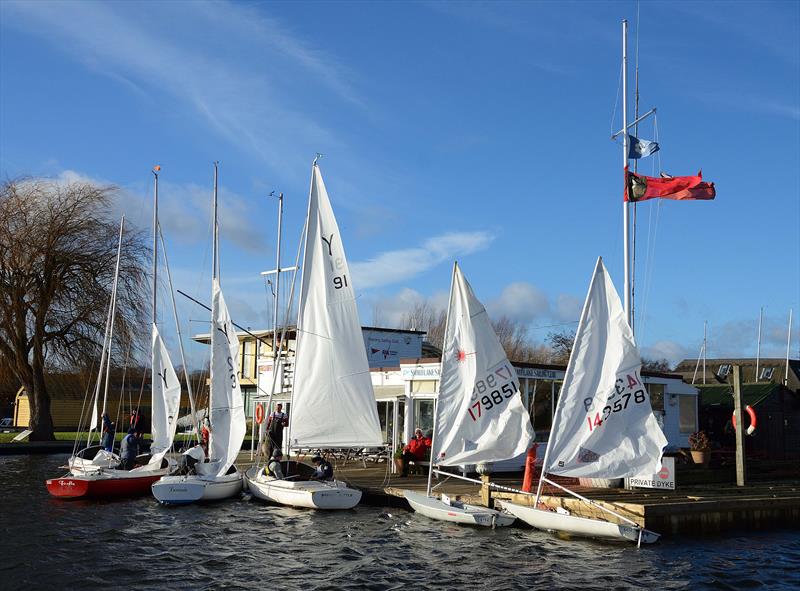 Flags at half mast during the Snowflake Sailing Club Boxing Day Open photo copyright Neil Foster / www.wfyachting.com taken at Snowflake Sailing Club and featuring the Yeoman/Kinsman class
