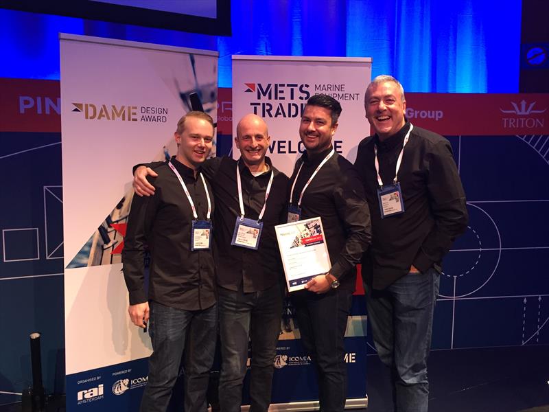 Zhik design and management team with DAME award for Isotak X at the METS trade show photo copyright Zhik taken at  and featuring the  class