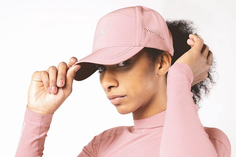 Eco Spandex top and sports cap - Breast Cancer Awareness range - photo © Zhik