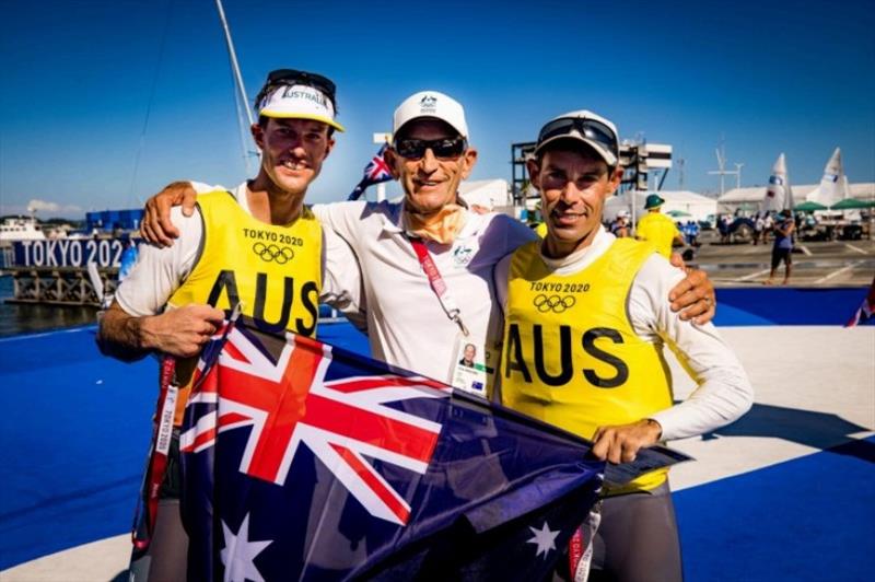 Zhik CEO Mat Belcher (R) after winning Gold at Tokyo Olympics with Coach Victor Kovalenko (middle) and Crew Will Ryan (L) photo copyright Sailing Energy taken at  and featuring the  class